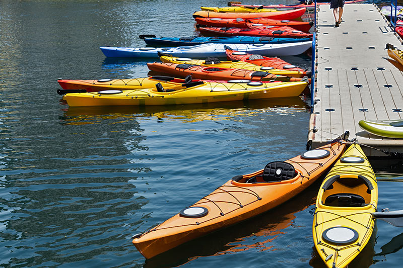 Sea Kayaks waiting for a adventurers to come to Vancouver Island, British Columbia, Canada.