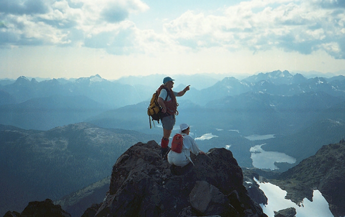 Hikers at the summit of the Golden Hinde, Strathcona Provincial Park, Vancouver Island, British Columbia